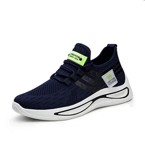 Navy blue lightweight knitted athletic sneaker with white sole and neon green fashion label