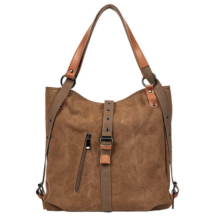 brown suede tote bag with adjustable straps and front zipper pocket