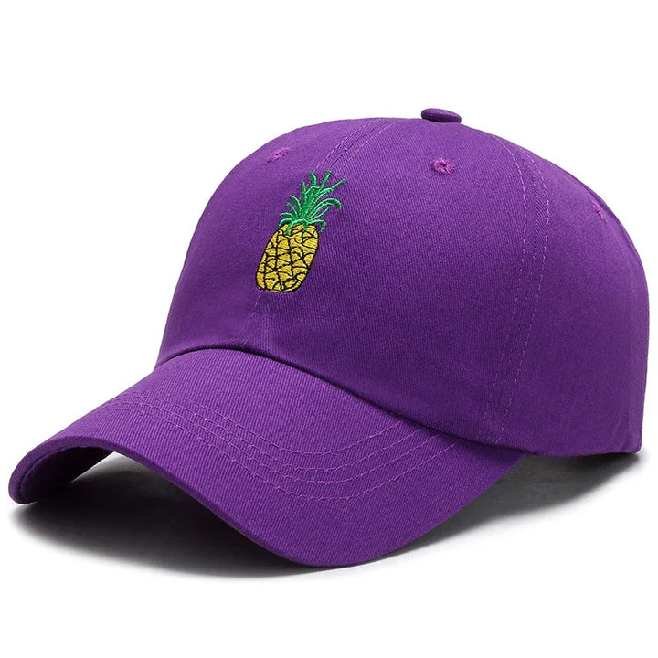 Purple baseball cap with embroidered yellow pineapple and green leaves design