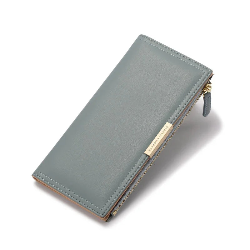 grey leather zippered wallet with gold accent plate on white background