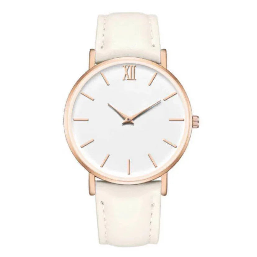 Minimalist wristwatch with white face, rose gold case, and cream leather strap