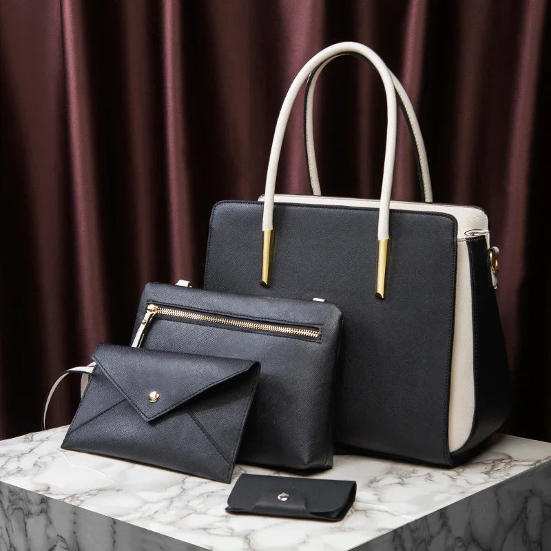 Set of black and white leather handbags and wallets on marble surface with dark brown curtain background