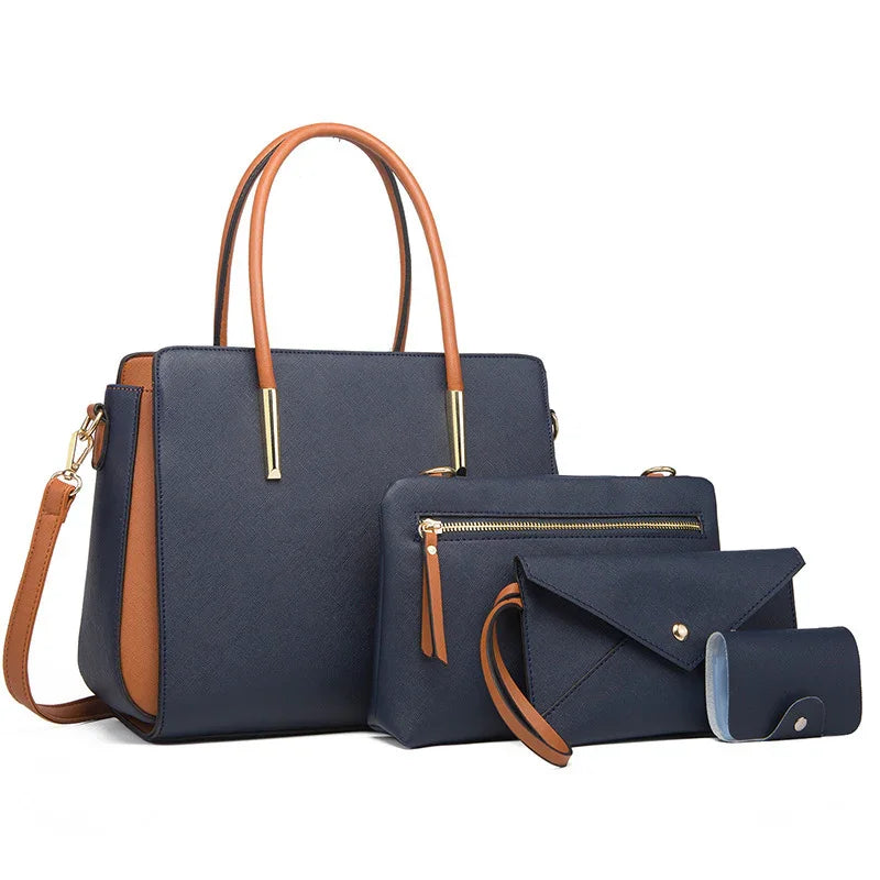 Set of navy blue and brown leather handbags and accessories including tote, clutch, envelope purse, and key holder