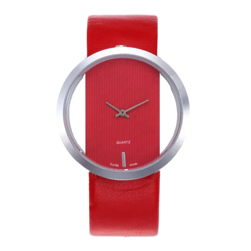 Minimalist red quartz wristwatch with transparent dial and silver bezel on red leather strap