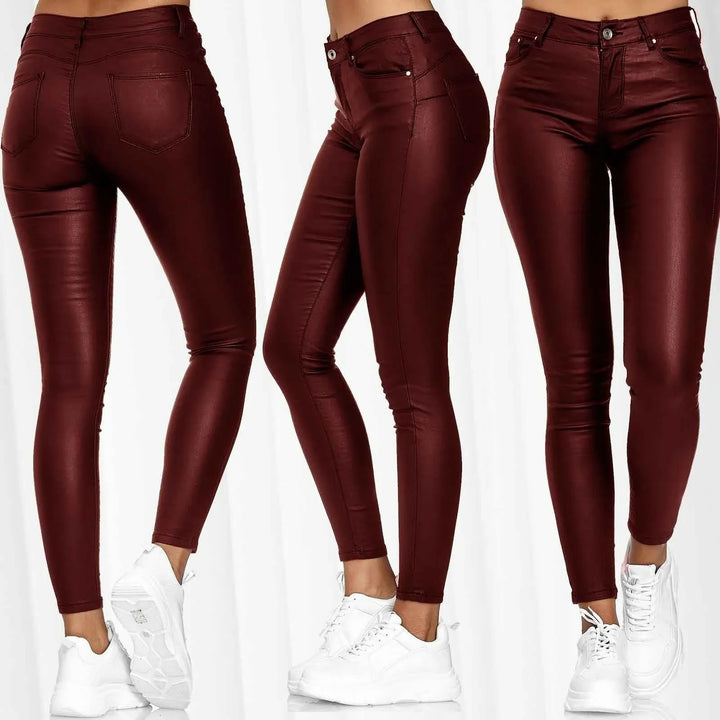 Women wearing high-waist burgundy coated skinny jeans with white sneakers, front and back views