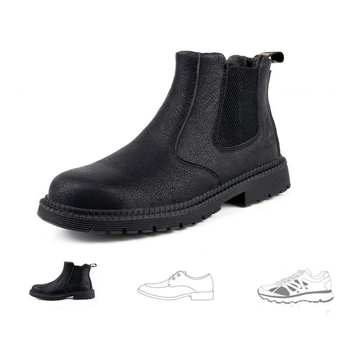 Black leather Chelsea boot with textured design and elastic side panel on white background