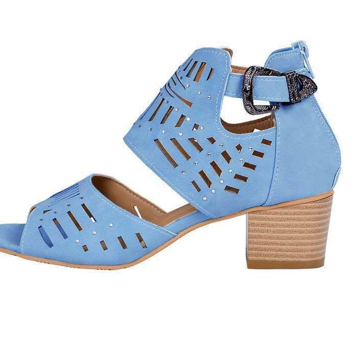 Light blue women’s open-toe block heel sandal with cutout design and decorative buckle