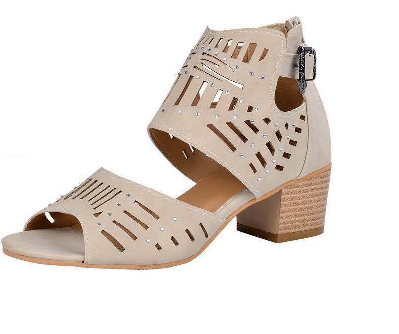 Beige open-toe women's sandal with cut-out details, stud embellishments, side buckle, and block heel