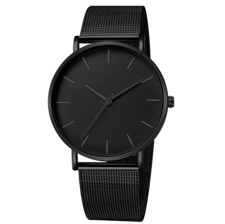 Minimalist all-black wristwatch with mesh strap and slim hour markers