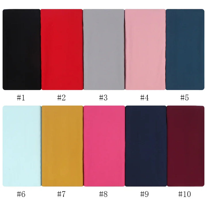 Ten rectangular fabric swatches in black, red, gray, pink, navy, light blue, mustard, fuchsia, dark blue, and burgundy colors