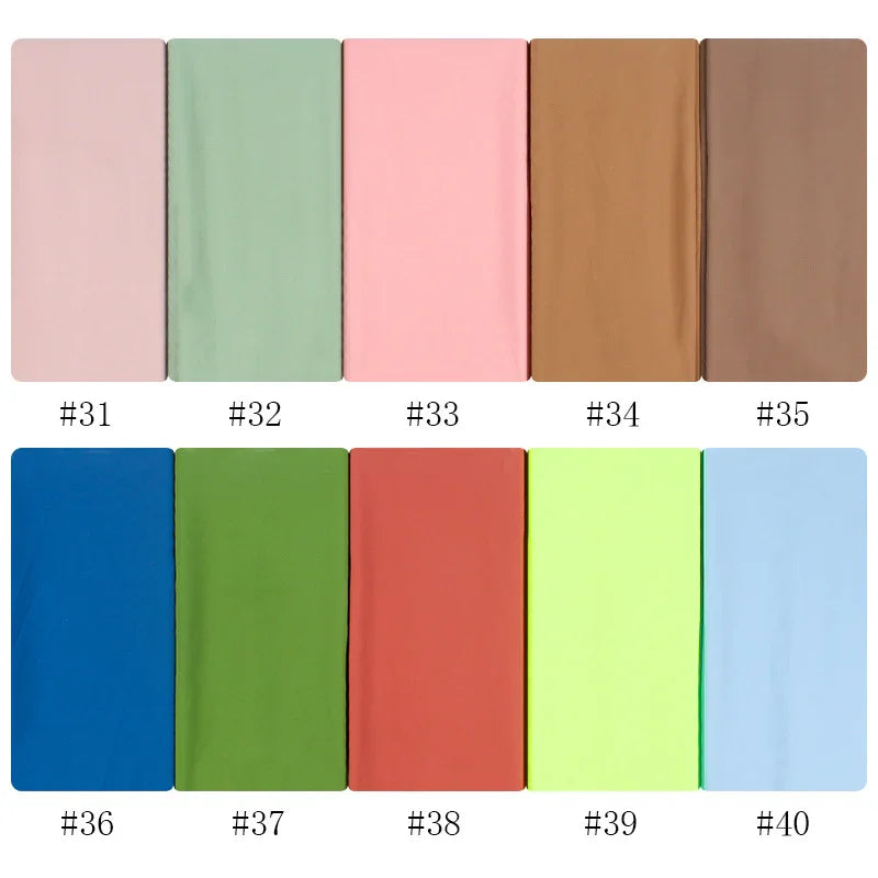 Fabric swatches in pastel and vibrant colors numbered 31 to 40, including pink, green, brown, blue, and yellow