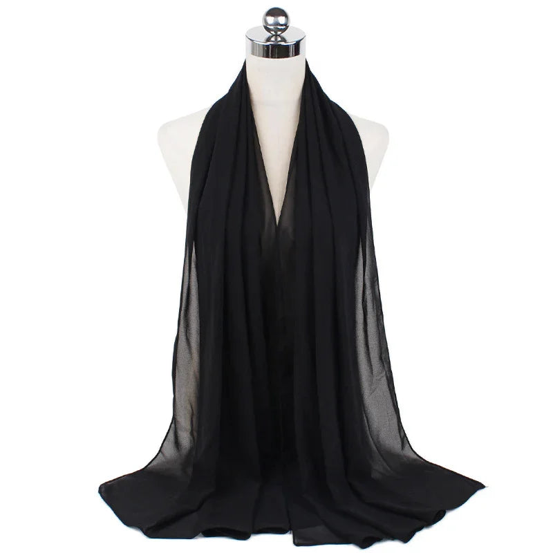 Black sheer chiffon scarf displayed on a white mannequin bust with a chrome neck cap