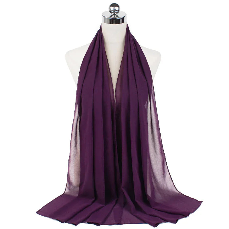 Purple chiffon scarf displayed on white mannequin bust with silver top
