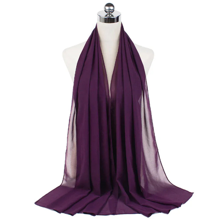 Purple chiffon scarf displayed on white mannequin bust with silver top