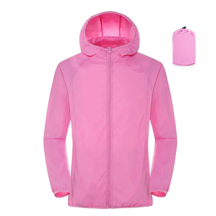 Light pink hooded windbreaker jacket with matching compact storage bag.