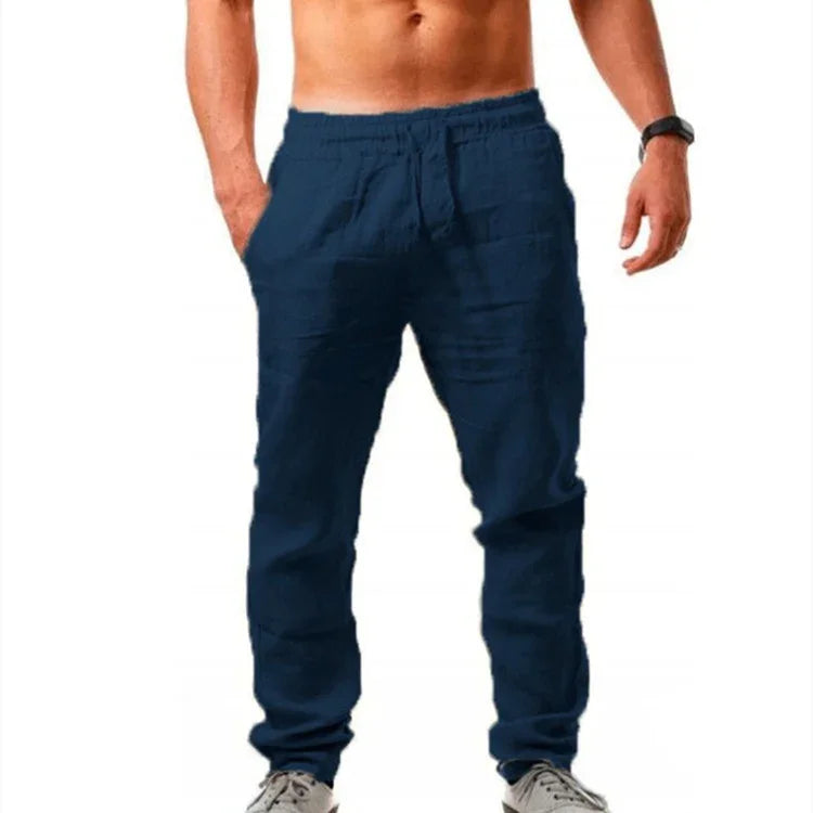 man wearing navy blue casual jogger pants with elastic waistband and pockets