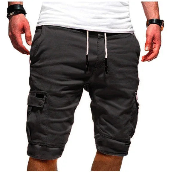 Men's black cargo shorts with side pockets and white drawstring, worn with a white t-shirt