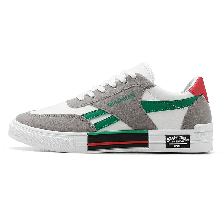 white and grey sneaker with green stripes, red heel tab, and black red striped sole detail
