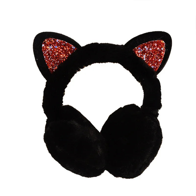 Black plush earmuffs with glittery red cat ears on a white background