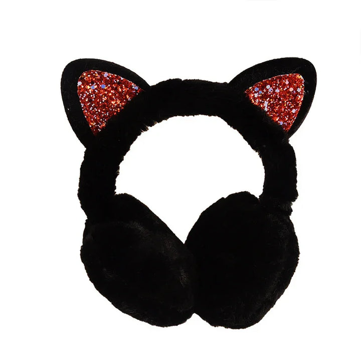 Black plush earmuffs with glittery red cat ears on a white background
