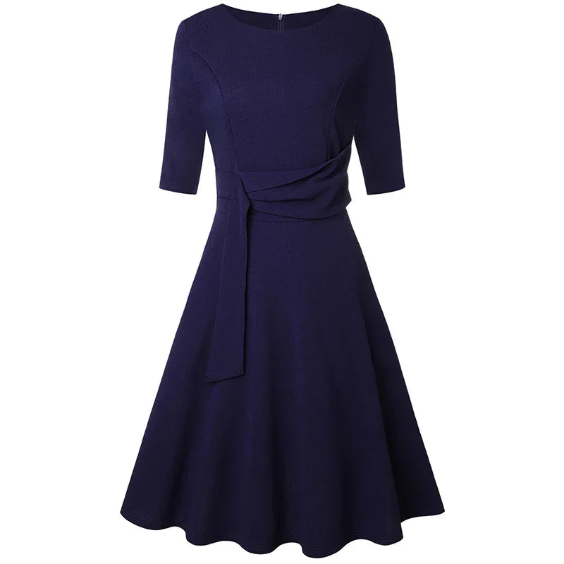 Elegant navy blue fit and flare dress with elbow sleeves and waist tie detail