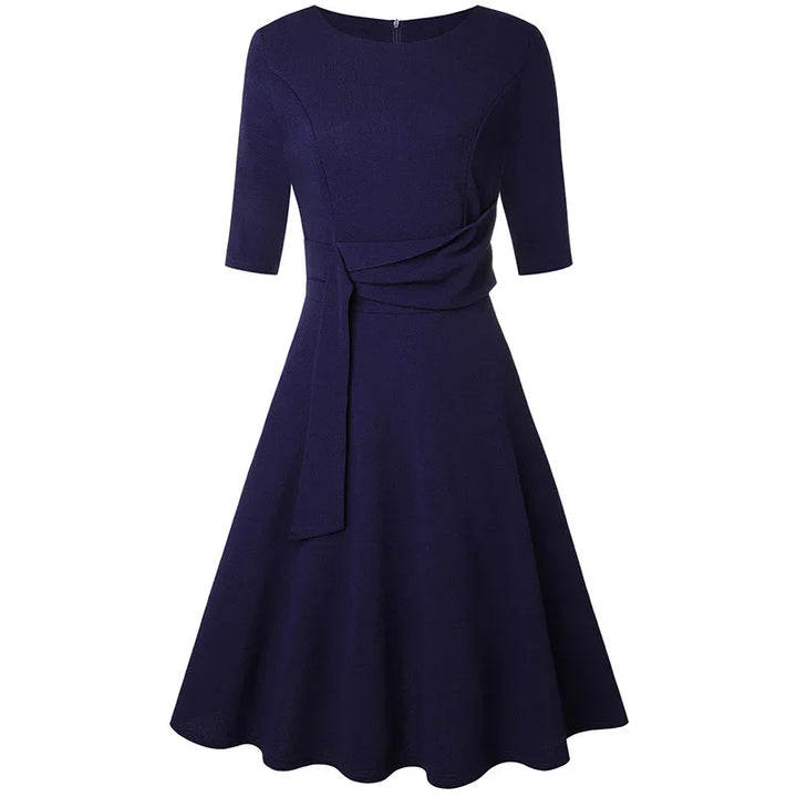 Elegant navy blue fit and flare dress with elbow sleeves and waist tie detail