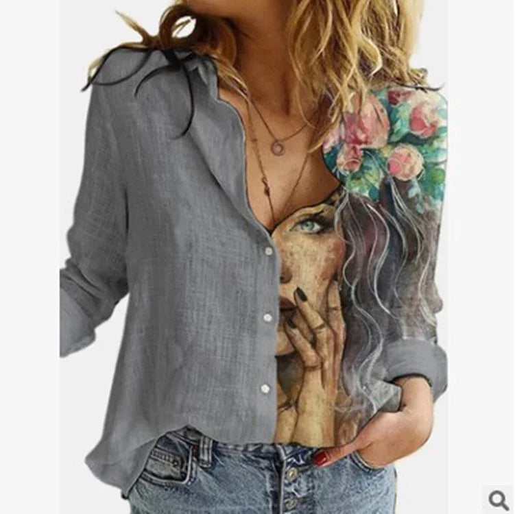 Women's gray button-up shirt with artistic face and floral crown print, paired with blue jeans