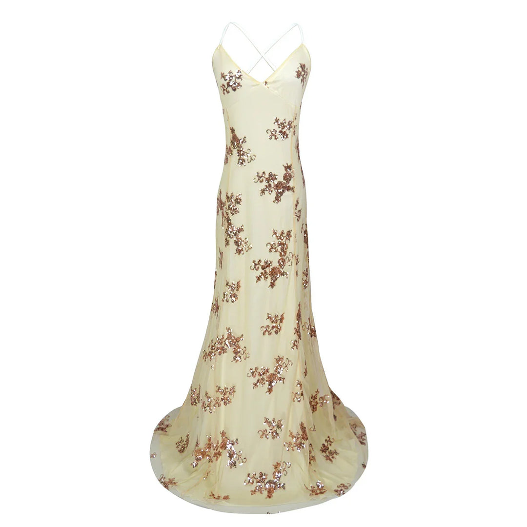 Elegant floor-length cream gown with rose gold sequin floral embellishments and thin crisscross straps