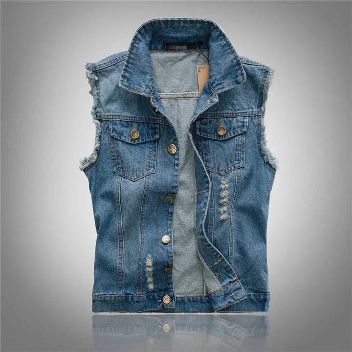 Distressed blue denim sleeveless vest with button front and chest pockets