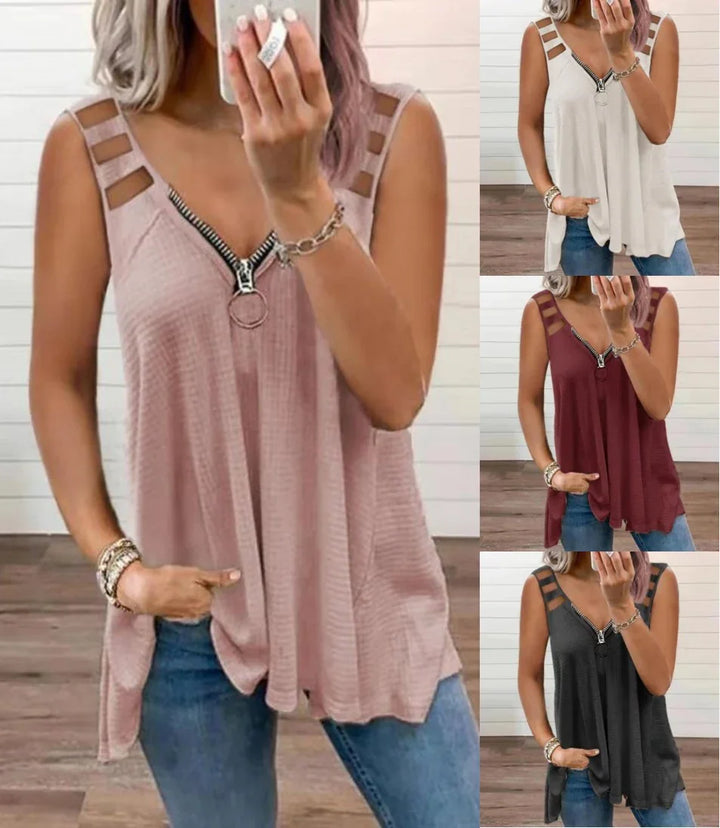Women wearing sleeveless casual tops in pink, white, burgundy, and black with zipper and ladder cutout details