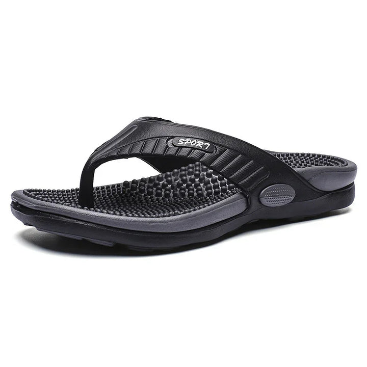 black and gray sport thong sandal with textured massage footbed and cushioned sole