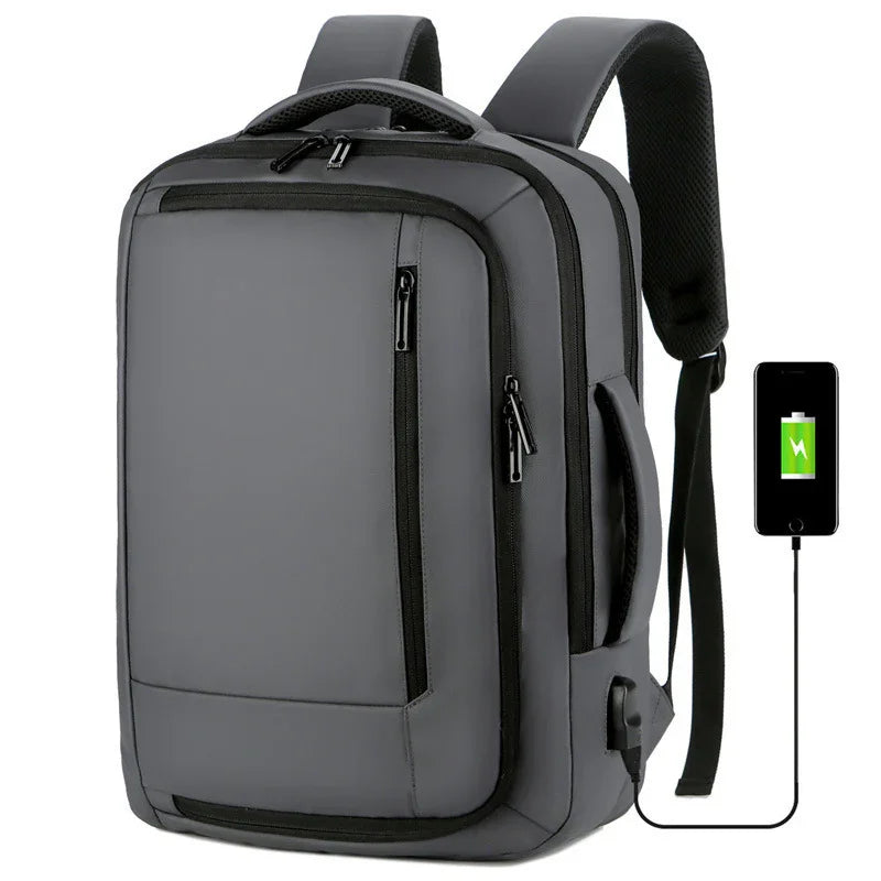 gray anti-theft backpack with multiple zippered compartments and external USB charging port