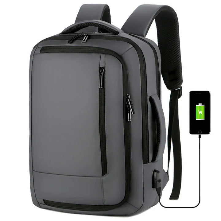 gray anti-theft backpack with multiple zippered compartments and external USB charging port