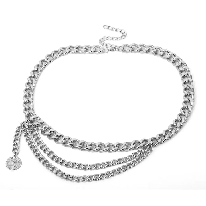 Silver layered chain necklace with coin pendant on white background