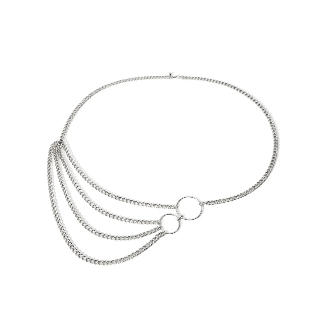 Silver chain necklace with two interlocking rings and three draped chains on white background