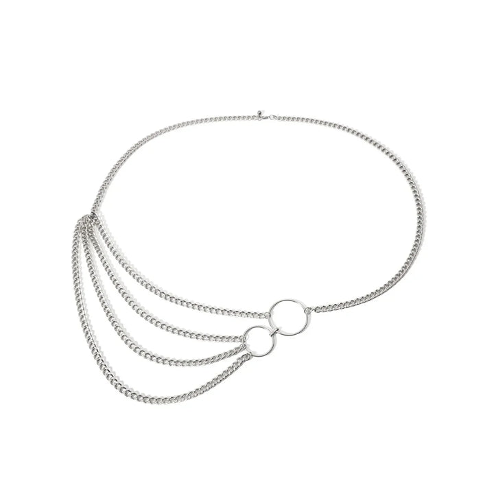 Silver chain necklace with two interlocking rings and three draped chains on white background