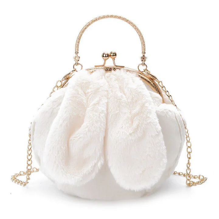 White fluffy bunny ear handbag with gold chain strap and vintage clasp handle