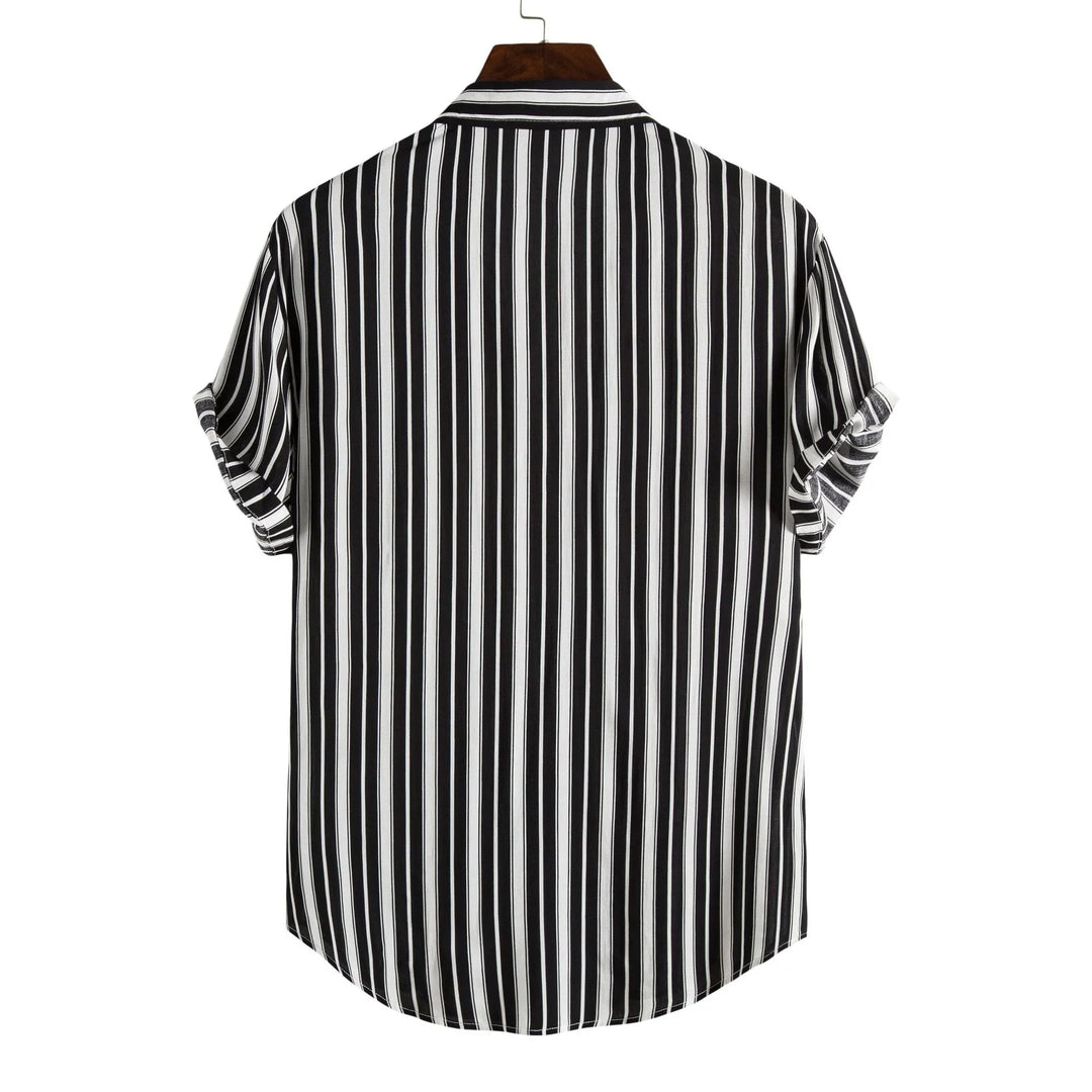 Back view of a black and white vertical striped short sleeve shirt on wooden hanger
