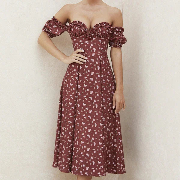 Woman wearing off-shoulder burgundy floral midi dress with puff sleeves and sweetheart neckline