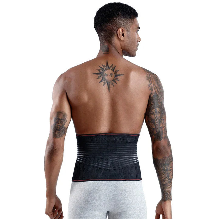 Athletic man wearing black waist trainer, back tattoos, gray shorts, isolated on white