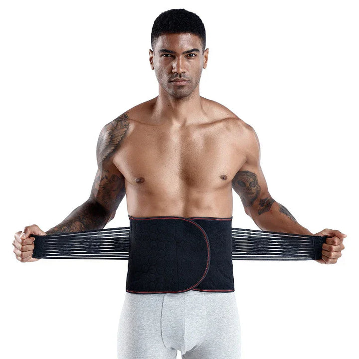 Athletic man wearing and adjusting a black waist trainer belt against a white background