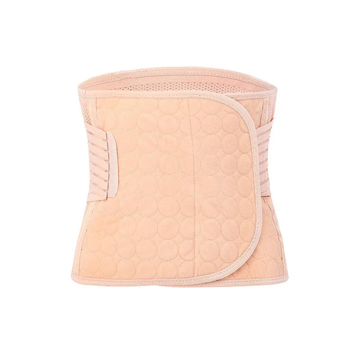 Peach-colored quilted postpartum belly wrap with velcro closure on white background
