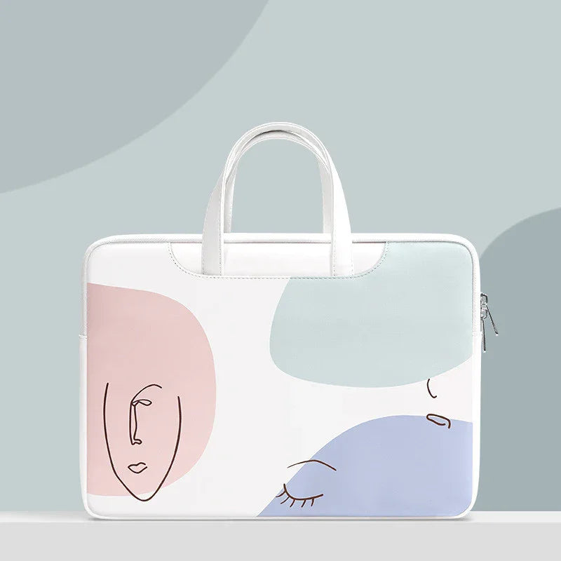 White laptop bag with abstract pastel shapes and minimalist line art faces against a light gray background