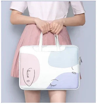 Woman in white shirt and pink skirt holding pastel-colored laptop bag with abstract face design
