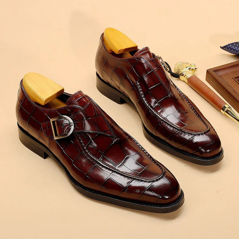Brown crocodile pattern leather men's dress shoes with silver buckle and wooden shoe trees