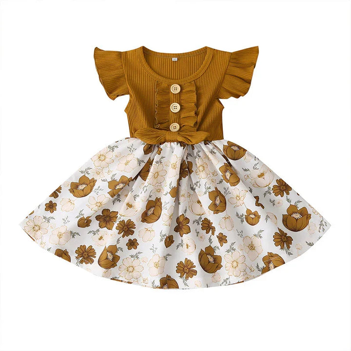 Girls mustard yellow bodice dress with ruffled sleeves, wooden buttons, and white floral skirt