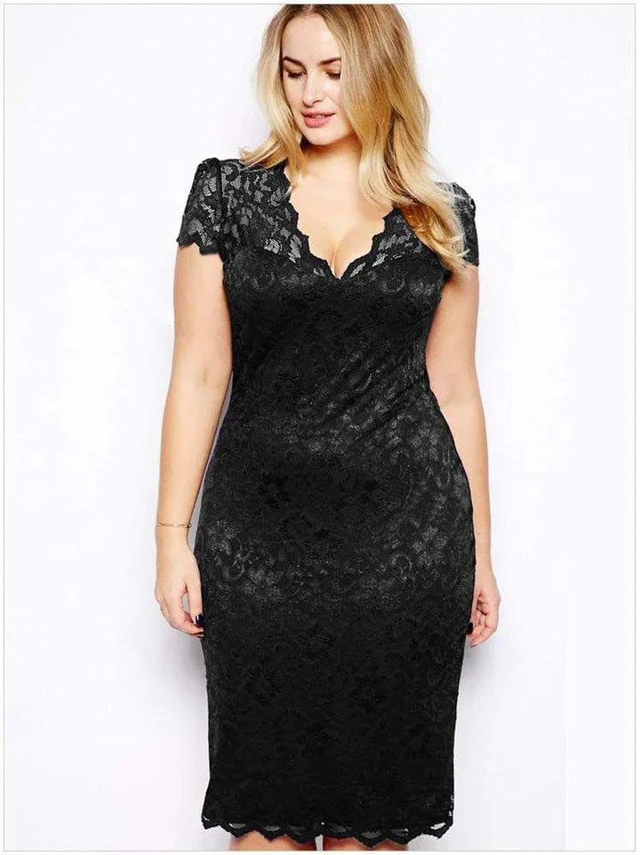 Plus size woman wearing elegant black lace knee-length dress with cap sleeves on white background