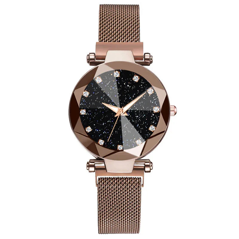 Rose gold mesh band wristwatch with faceted bezel and black glitter dial with crystal markers