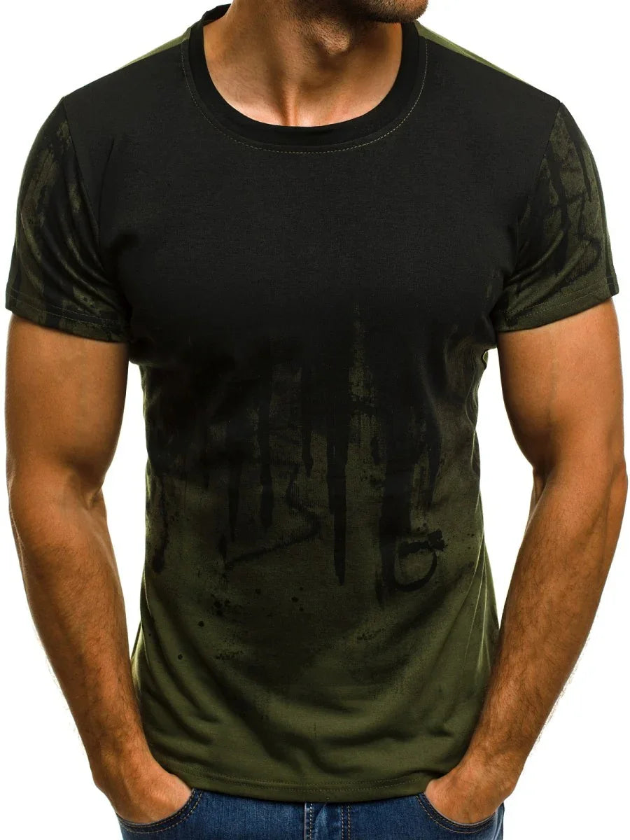 Man wearing black and olive green short sleeve t-shirt with abstract paint drip design