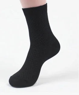 Black textured ankle sock on a white background, showcasing stretch fit and seamless design